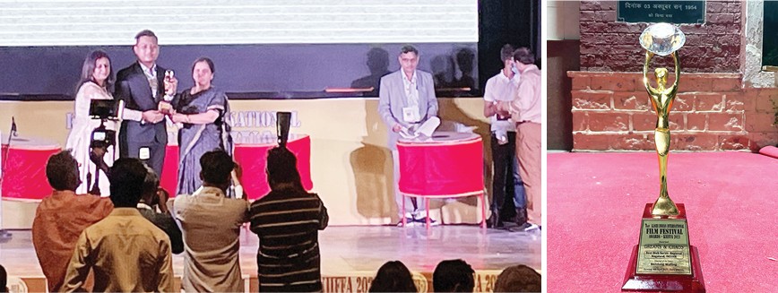 Temsuwapang, member of the technical team of the web series Dreams and Chaos receiving the award on behalf of the team on April 4.